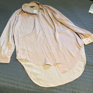 Blush pink , soft silky express just above knee (the back part) shirt